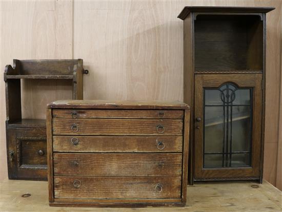 Two oak wall cupboards and a nest of drawers